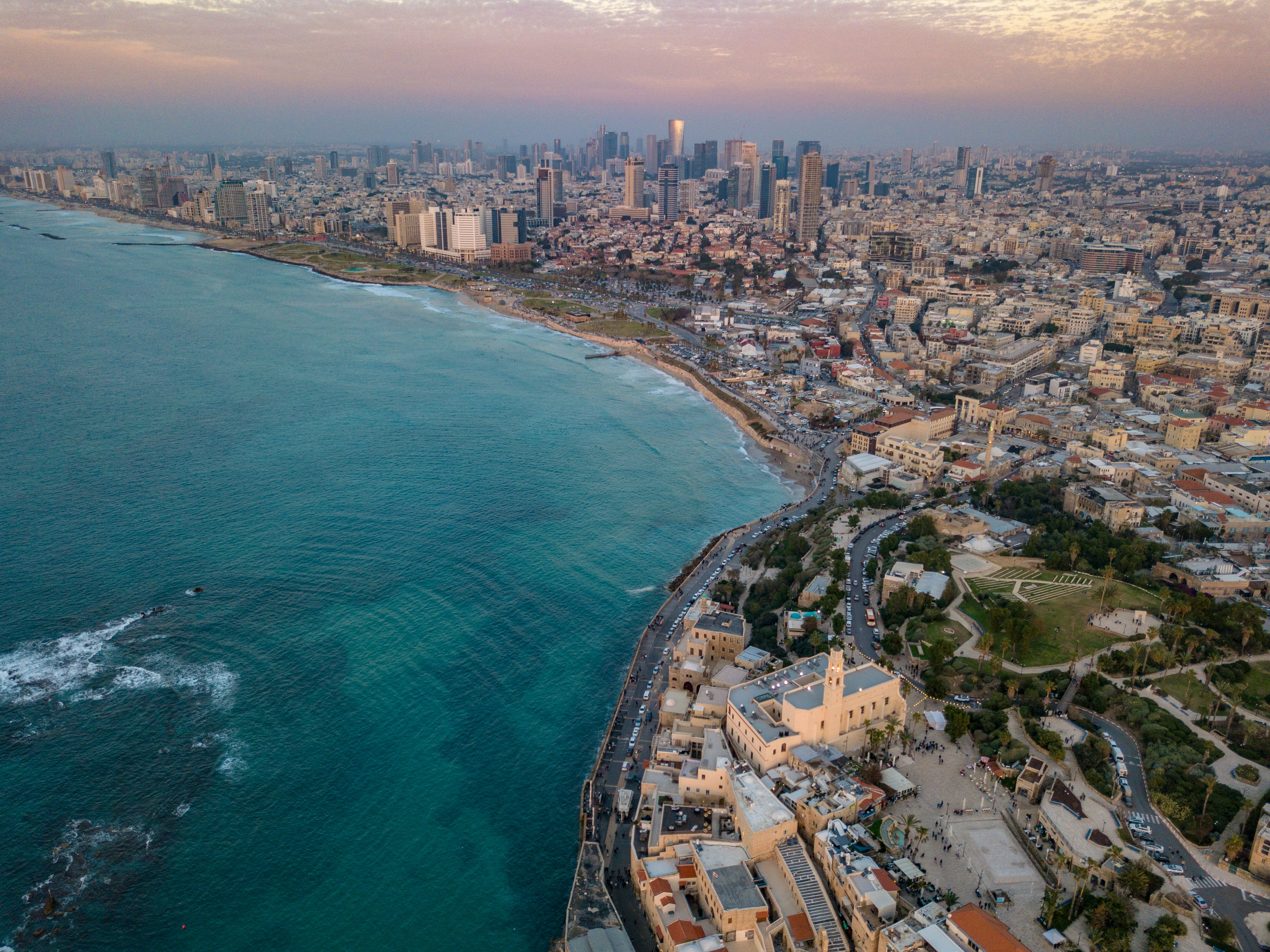 aerial photo of city by the sea